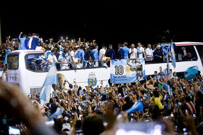 Soccer Football - Argentina team arrives to Buenos Aires after winning the World Cup - Buenos Aires, Argentina - December 20, 2022 Fans gather outside the Association of