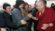 Shaking hands with the Dalai Lama is a lifelong experience for some.