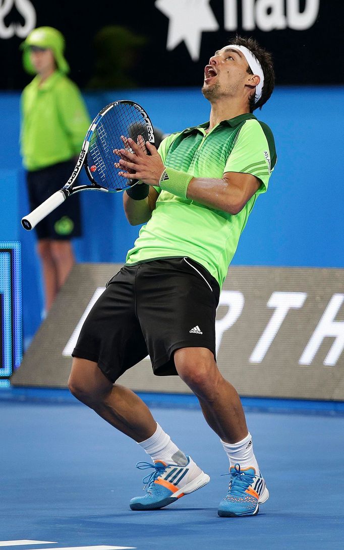 Fabio Fognini of Italy reacts to a shot from John Isner of the U.S. during their men's singles tennis match at the 2015 Hopman Cup in Perth