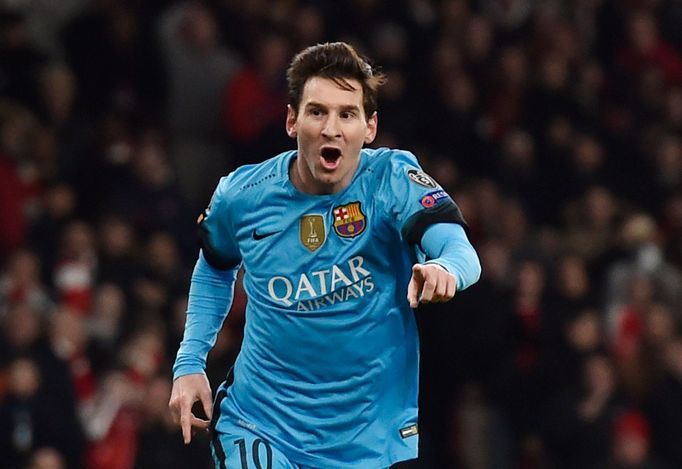 Lionel Messi celebrates after scoring the first goal for Barcelona