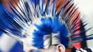 A Chelsea fean wears wig before their Champions League semi-final second leg soccer match against Atletico Madrid at Stamford Bridge Stadium in London April 30, 2014. REU