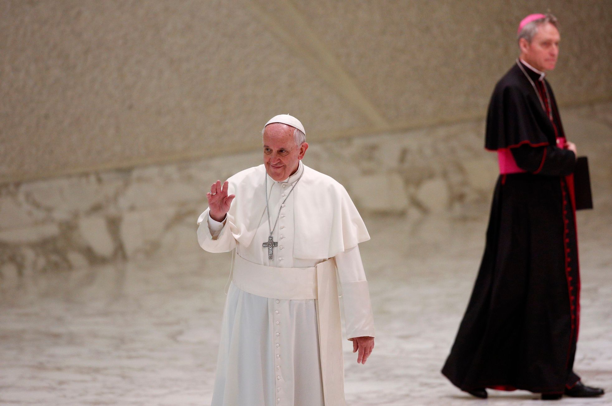 Pope Francis waves as he arrives to lead a special audience at the Paul VI' hall at the Vatican
