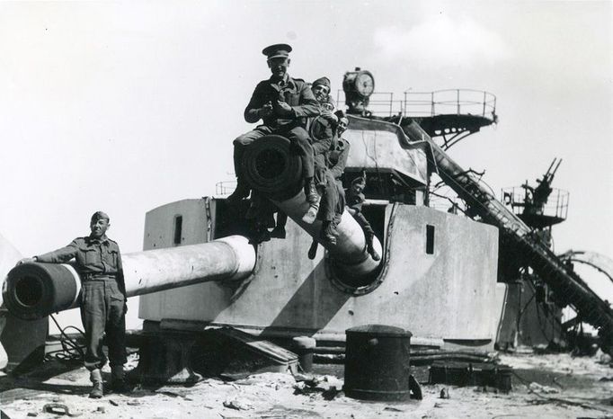 Posing on a destroyed Italian ship.