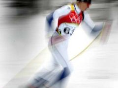 Estonská běžkyně na lyžích Kristina Šmigunová na olympiádě září. PO skiatlonu vyhrála i závod na 10 km klasicky.