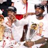 Miami Heat's Wade, James and Bosh celebrate winning the NBA