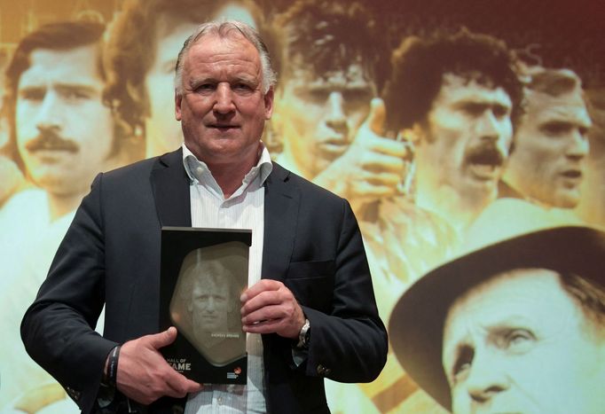 FILE PHOTO: German soccer legend Andreas Brehme poses after being included into the Hall of Fame, a permanent exhibition honouring German soccer legends at the German Foo