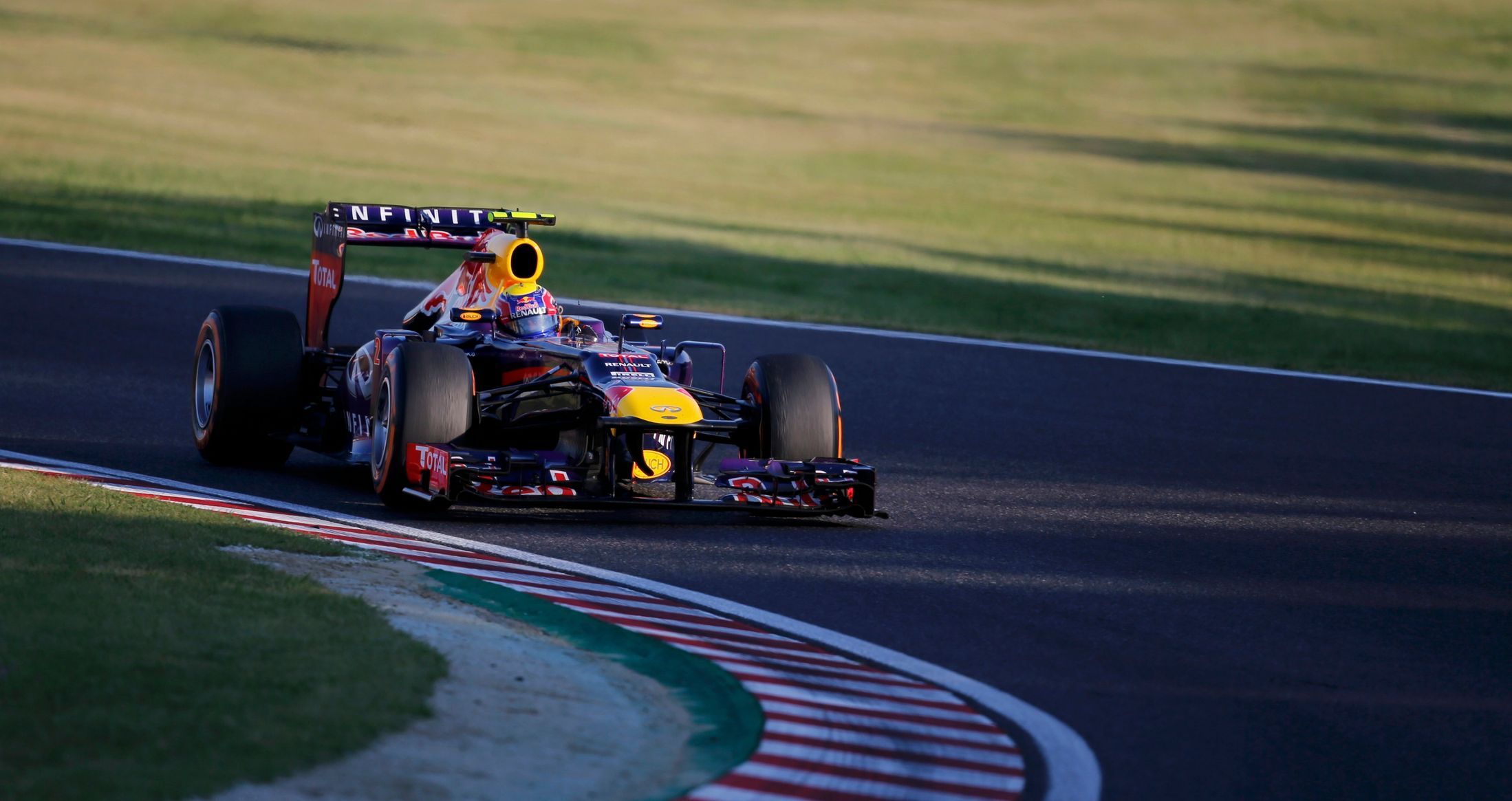 Red Bull Formula One driver Webber of Australia races during the Japanese F1 Grand Prix at the Suzuka circuit