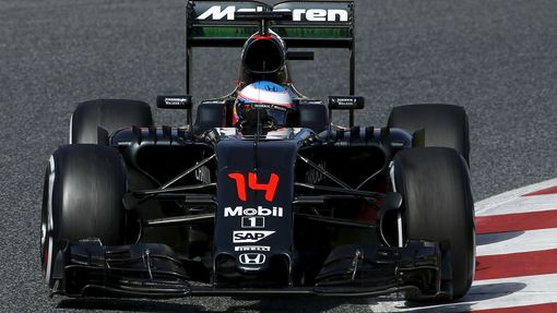 .McLaren F1 driver Fernando Alonso takes a curve.