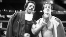 Carl Weathers jako Apollo Creed a Sylvester Stallone coby Rocky Balboa v prvním Rockym z roku 1976.