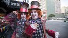 Cosplay enthusiasts Michael and Breen are dressed like the Mad Hatter from &quot;Alice in Wonderland&quot; during the 2015 Comic-Con International Convention in San Diego