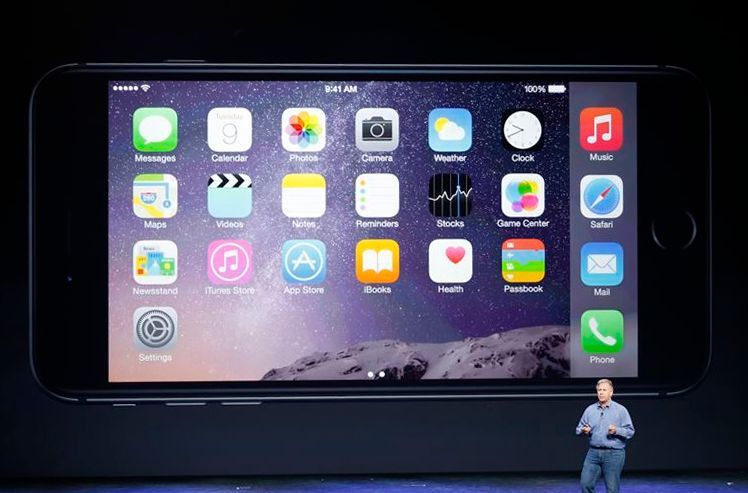 Phil Schiller, Senior Vice President at Apple, Inc. speaks about the iPhone 6 during an Apple event at the Flint Center in Cupertino
