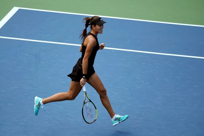 Ana Ivanovičová of Serbia celebrates apoint against Alison Riske of the U.S. during their match at the 2014 U.S. Open tennis tournament in New York