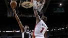 San Antonio Spurs small forward Kawhi Leonard (2) scores on Miami Heat center Chris Bosh (1) in the first half during Game 7 of their NBA Finals basketball playoff in Mia