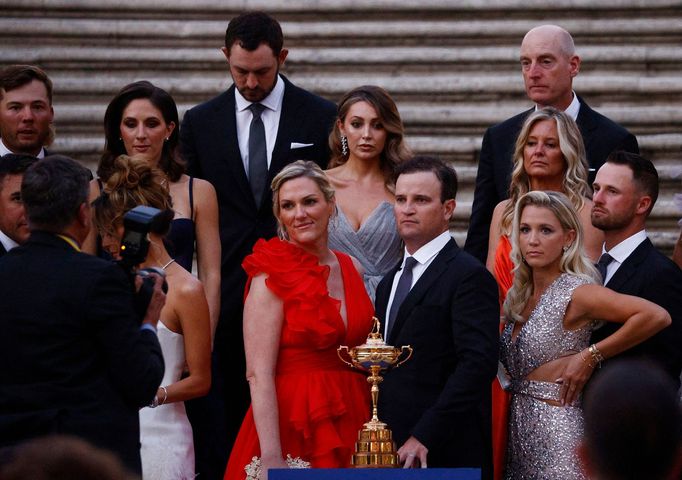 Golf - The 2023 Ryder Cup - Rome, Italy - September 27, 2023 Team USA captain Zach Johnson and wife, Kim Barclay pose with the Ryder Cup trophy at the Piazza di Spagna in