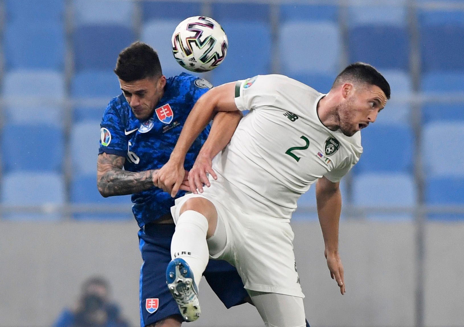 fotbal, kvalifikace Euro 2020 play off - Slovensko - Irsko Matthew Doherty in action with Slovakia’s Robert Mazáň