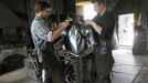 Blacksmith brothers Johann (R) and Georg Schmidberger work on a harness for the Vatican Swiss Guard at their workshop in Molln, Upper Austria June 12, 2012. Johann, 29, and Georg, 28, produce made-to-order handmade harnesses for the Vatican, which take 120 hours of handiwork per piece and hardly differs from the 500-year-old originals. The brothers carry on the tradition of the blacksmith trade in the fifth generation of their family. REUTERS/Lisi Niesner (AUSTRIA - Tags: SOCIETY MILITARY) Published: Čer. 12, 2012, 9:23 odp.