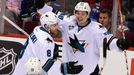 San Jose Sharks forward Tomas Hertl (48) celebrates his goal against Vancouver Canucks goaltender Ryan Miller (not pictured) with forward Joe Pavelski (8) and forward Joe