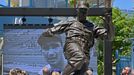 Jun 18, 2022; Los Angeles, CA, USA;  A video montage of the career of Sandy Koufax is shown on a screen behind the Jackie Robinson statue during an unveiling ceremony for