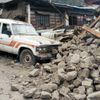 Car is seen next to a collapsed house, after a 7.9 magnitude earthquake hit Nepal, in Xigaze Prefecture