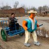 Čínský farmář vyrábí roboty