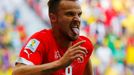 Switzerland's Haris Seferovic celebrates after scoring a goal to defeat Ecuador in their 2014 World Cup Group E soccer match at the Brasilia national stadium in Brasilia,