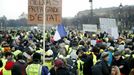 Protesters wearing yellow vests take part in a demonstration by the "yellow vests" movement, in Paris, France, January 19, 2019. The sign reads "Media State Propaganda".