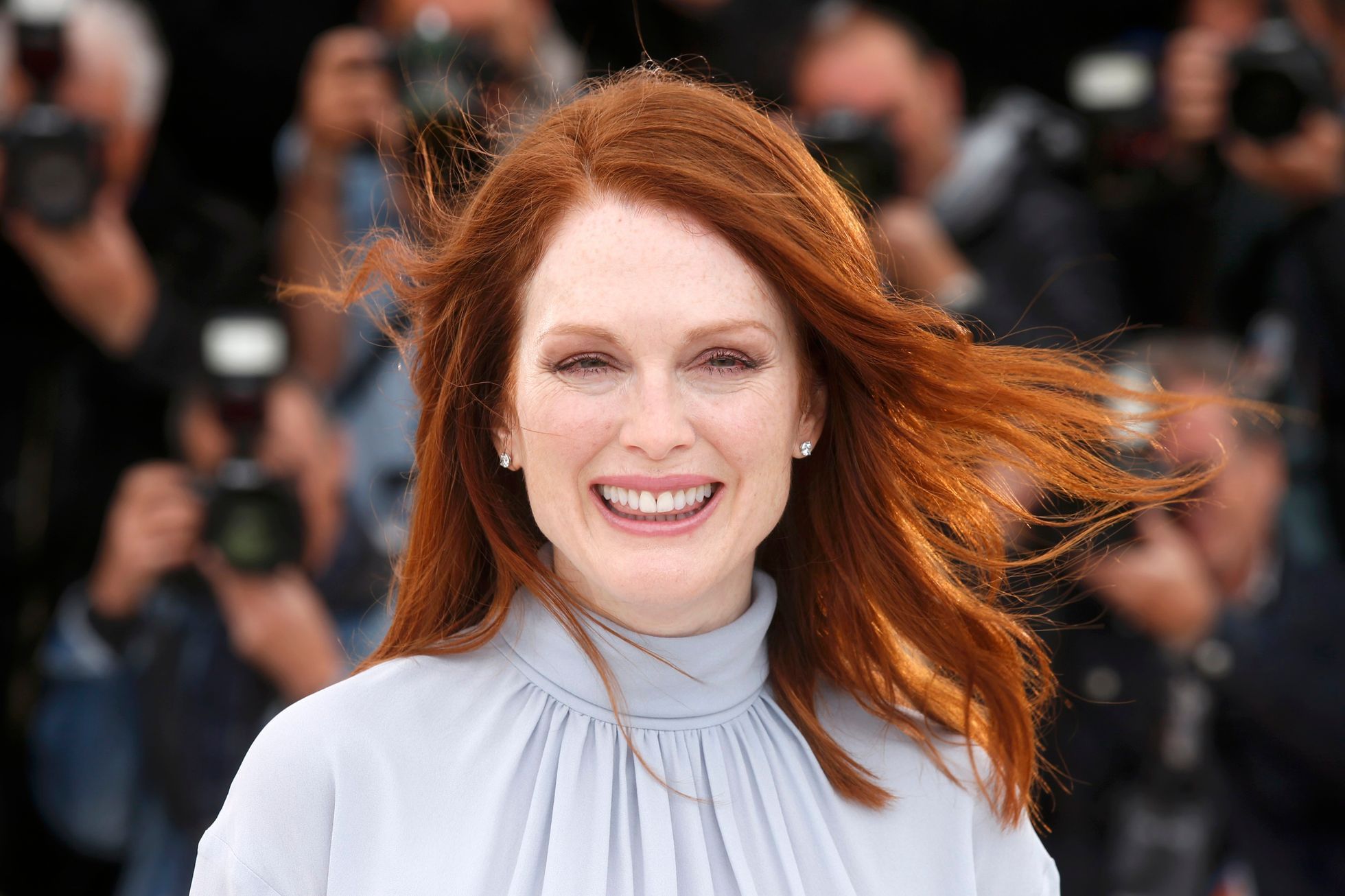 Cast member Julianne Moore poses during a photocall for the film &quot;Maps to the Stars&quot; in competition at the 67th Cannes Film Festival in Cannes