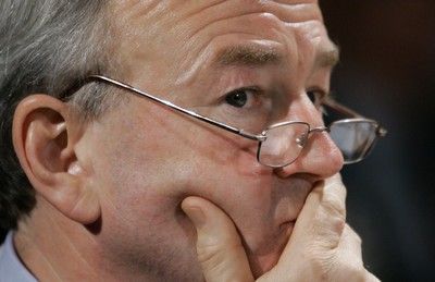 Generální tajemník Poradního výboru odborových organizací John G. Evans