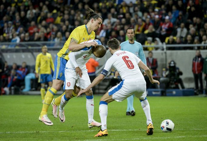 Sweden's Zlatan Ibrahimovic fights for the ball with Czech Republic's Theodor Gebre Selassie and Tomas Sivok during their friendly international soccer match at Friends A