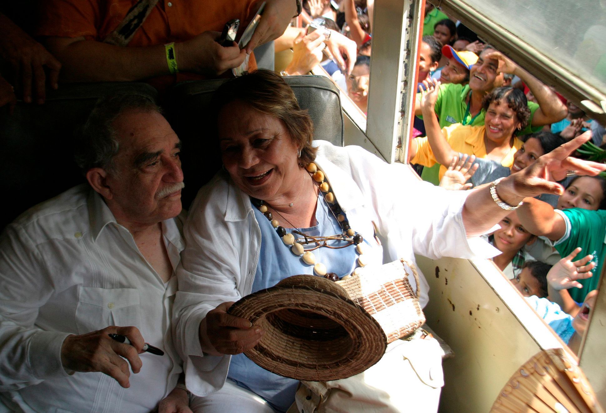 File photo shows Garcia Marquez speaking with his wife Mercedes after their arrival in Aracataca