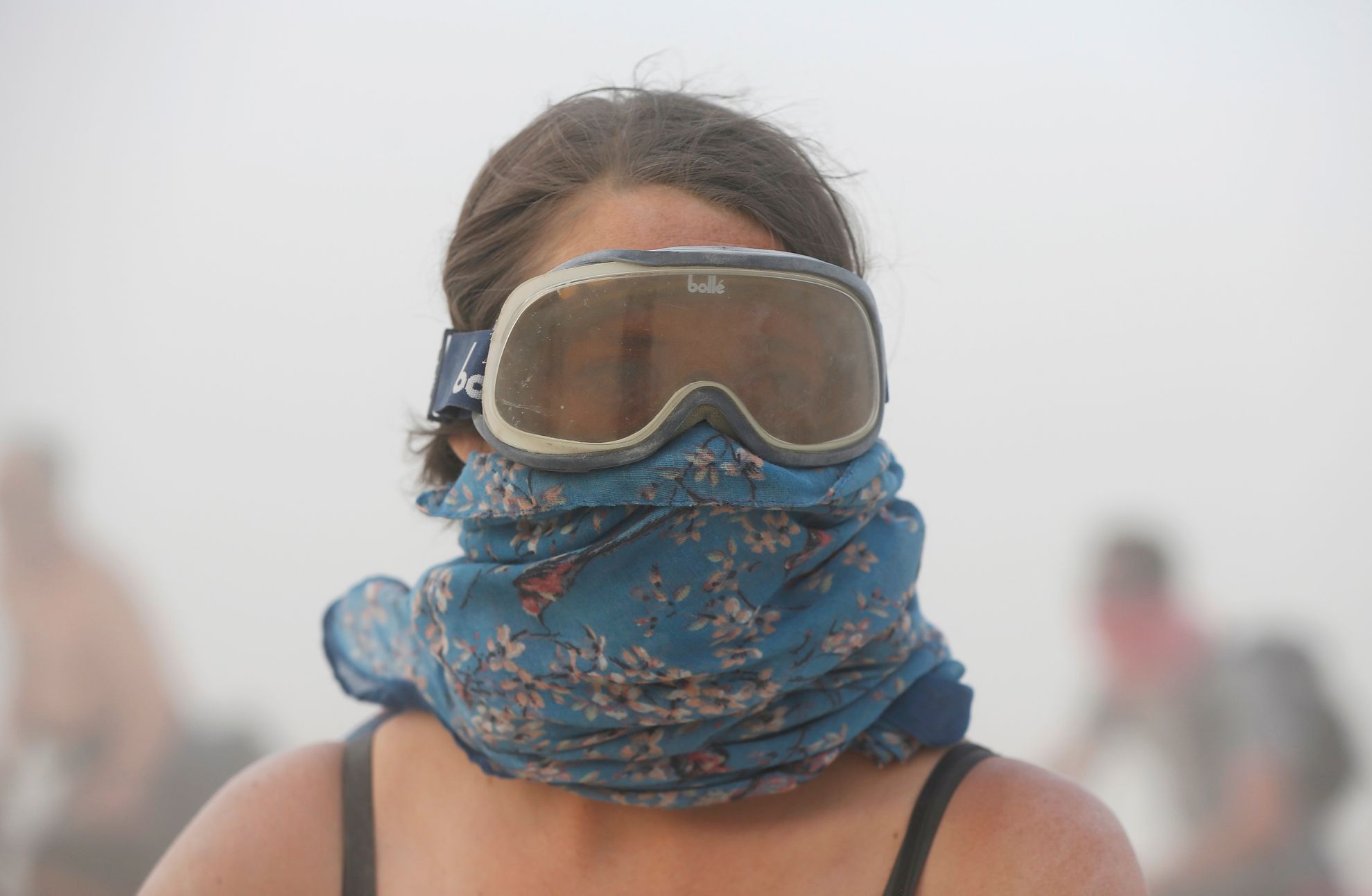 Grayson Morris navigates a dust storm during the Burning Man 2014 &quot;Caravansary&quot; arts and music festival in the Black Rock Desert of Nevada