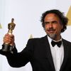 Director Alejandro G. Inarritu poses with the Oscar for best original screenplay for &quot;Birdman&quot; at the 87th Academy Awards in Hollywood
