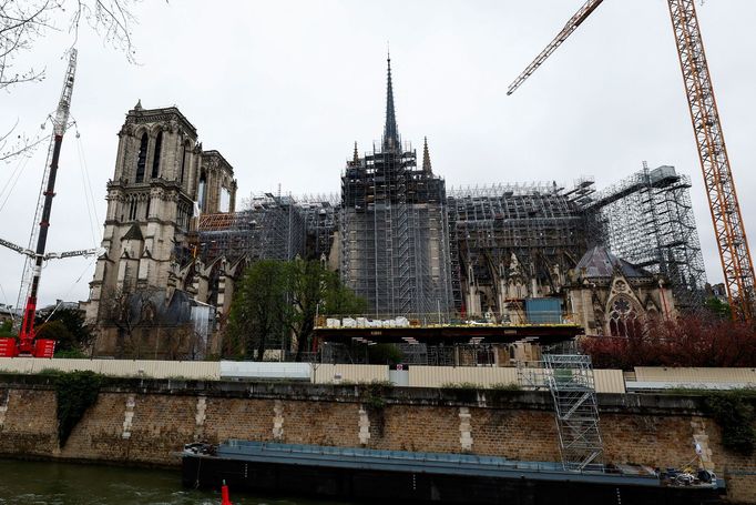 A general view shows the Notre-Dame de Paris Cathedral, which was ravaged by a fire in 2019, with a new spire, surmounted by the rooster and the cross, as restoration wor