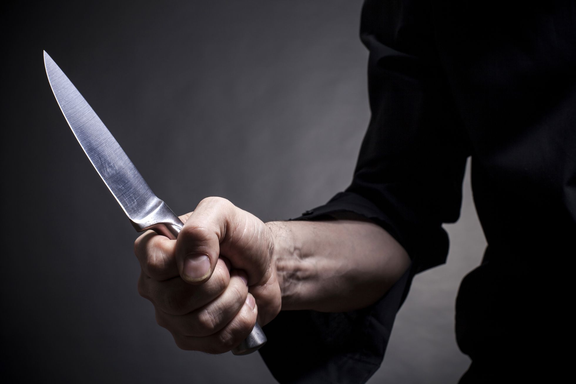 Nůž a ruka, ilustrační foto