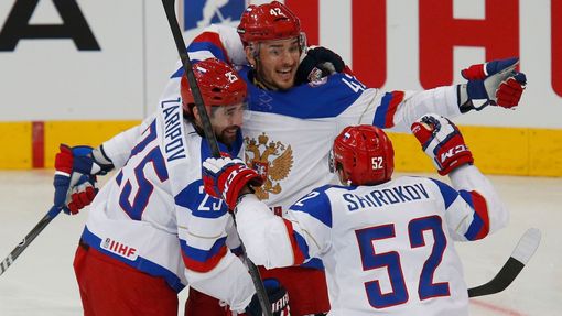 Russia's Artyom Anisimov celebrates his goal against France with team mates during the first period of their men's ice hockey World Championship quarter-final game at Min