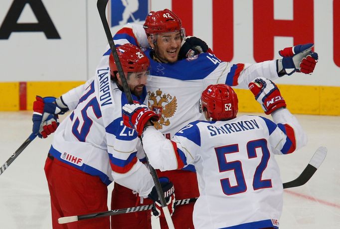 Russia's Artyom Anisimov celebrates his goal against France with team mates during the first period of their men's ice hockey World Championship quarter-final game at Min