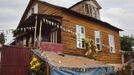 Old wooden planks cover facade of traditional colonial-era Board House in Murray Town of Sierra Leone's capital Freetown