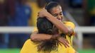 Marta (BRA) of Brazil embraces Andressa Alves (BRA) of Brazil after she scored the second goal.