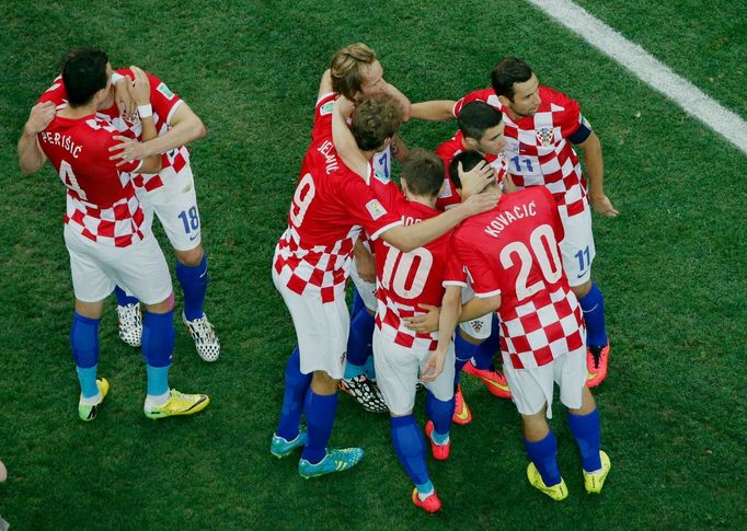 Croatia's players celebrate an own goal by Brazil's Marcelo during their 2014 World Cup opening match at the Corinthians arena in Sao Paulo June 12, 2014. REUTERS/Fabrizi