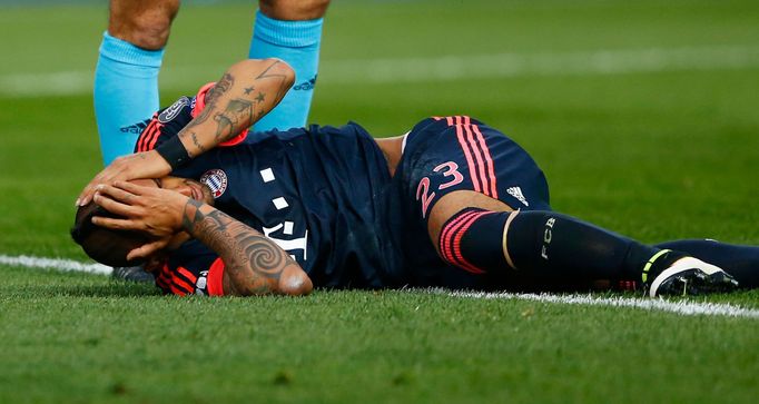 Bayern Munich's Arturo Vidal down injured