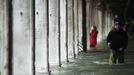 A man walks through a flooded street during a period of seasonal high water in Venice November 11, 2012. The water level in the canal city rose to 149 cm (59 inches) above normal, according to the monitoring institute. REUTERS/Manuel Silvestri (ITALY - Tags: ENVIRONMENT SOCIETY TPX IMAGES OF THE DAY) Published: Lis. 11, 2012, 2:20 odp.