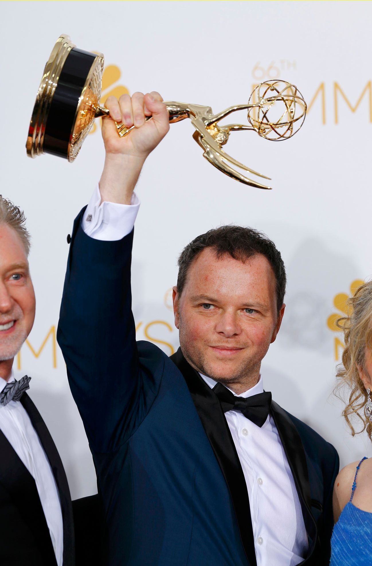 Producer Noah Hawley poses with his Outstanding Miniseries Award for FX Networks miniseries &quot;Fargo&quot; at the 66th Primetime Emmy Awards in Los Angeles