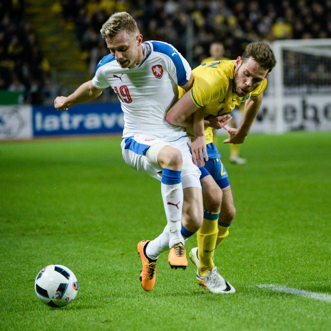 The Czech Republic's Laadislv Krejci (L) fights for the ball with Sweden's Emil Salomonsson during the friendly international soccer match at the Friends Arena in Stock