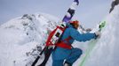 Austrian freeride skier Karin Huttary climbs up a steep mountain during a freeride skiing tour on Seegrube mountain in Innsbruck January 19, 2013. Backcountry or freeride skiers ski away from marked slopes with no set course or goals, in untamed snow, generally in remote mountainous areas. Picture taken January 19, 2013. REUTERS/ Dominic Ebenbichler (AUSTRIA - Tags: SPORT SKIING SOCIETY) Published: Led. 21, 2013, 10:19 dop.