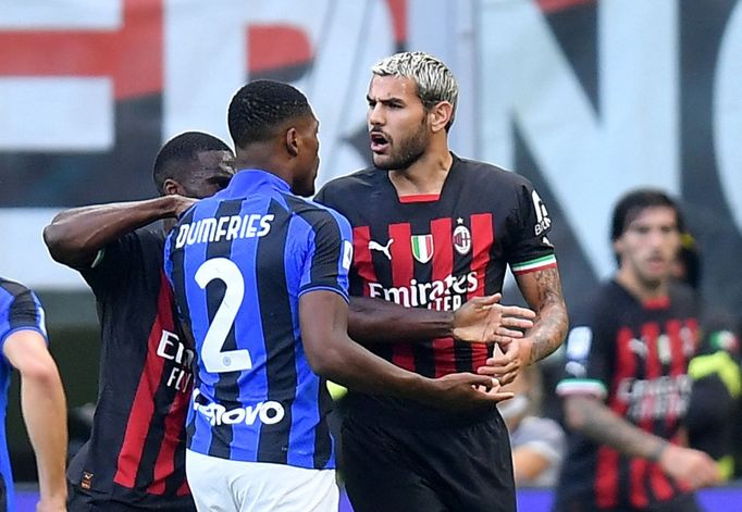 Soccer Football - Serie A - AC Milan v Inter Milan - San Siro, Milan, Italy - September 3, 2022 AC Milan's Theo Hernandez clashes with Inter Milan's Denzel Dumfries durin