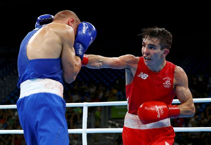 FILE PHOTO: Michael Conlan of Ireland and Vladimir Nikitin of Russia compete in Olympic boxing in Rio de Janeiro, Brazil - 16/08/2016. REUTERS/Peter Cziborra/File/File Ph