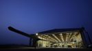 The Solar Impulse aircraft is being pulled out of the hangar for take off at Payerne airport May 24, 2012. The Solar Impulse HB-SIA prototype aircraft, which has 12,000 solar cells built into its 64.3 metres (193 feet) wings, attempted its first intercontinental flight from Payerne to Rabat in Morocco with a few days for a technical stop and a change of pilot in Madrid. This flight will act as a final rehearsal for the 2014 round-the-world flight. REUTERS/Denis Balibouse (SWITZERLAND - Tags: TRANSPORT SCIENCE TECHNOLOGY SOCIETY) Published: Kvě. 24, 2012, 7:24 dop.