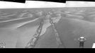 Opportunity's View on Sol 1798 NASA's Mars Exploration Rover Opportunity used its navigation camera to take the images combined into this 180-degree view of the rover's surroundings during the 1,798th Martian day, or sol, of Opportunity's surface mission (Feb. 13, 2009). North is at the center, west on the left, east on the right. The rover had driven 111 meters (364 feet) southward on the preceding sol. Tracks from that drive recede northward in this view. For scale, the distance between the parallel wheel tracks is about 1 meter (about 40 inches). The terrain in this portion of Mars' Meridiani Planum region includes dark-toned sand ripples and lighter-toned bedrock. This view is presented as a cylindrical projection with geometric seam correction. Image Credit: NASA/JPL-Caltech