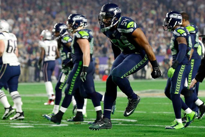 Feb 1, 2015; Glendale, AZ, USA; Seattle Seahawks middle linebacker Bobby Wagner (54) celebrates after an interception during the third quarter against the New England Pat