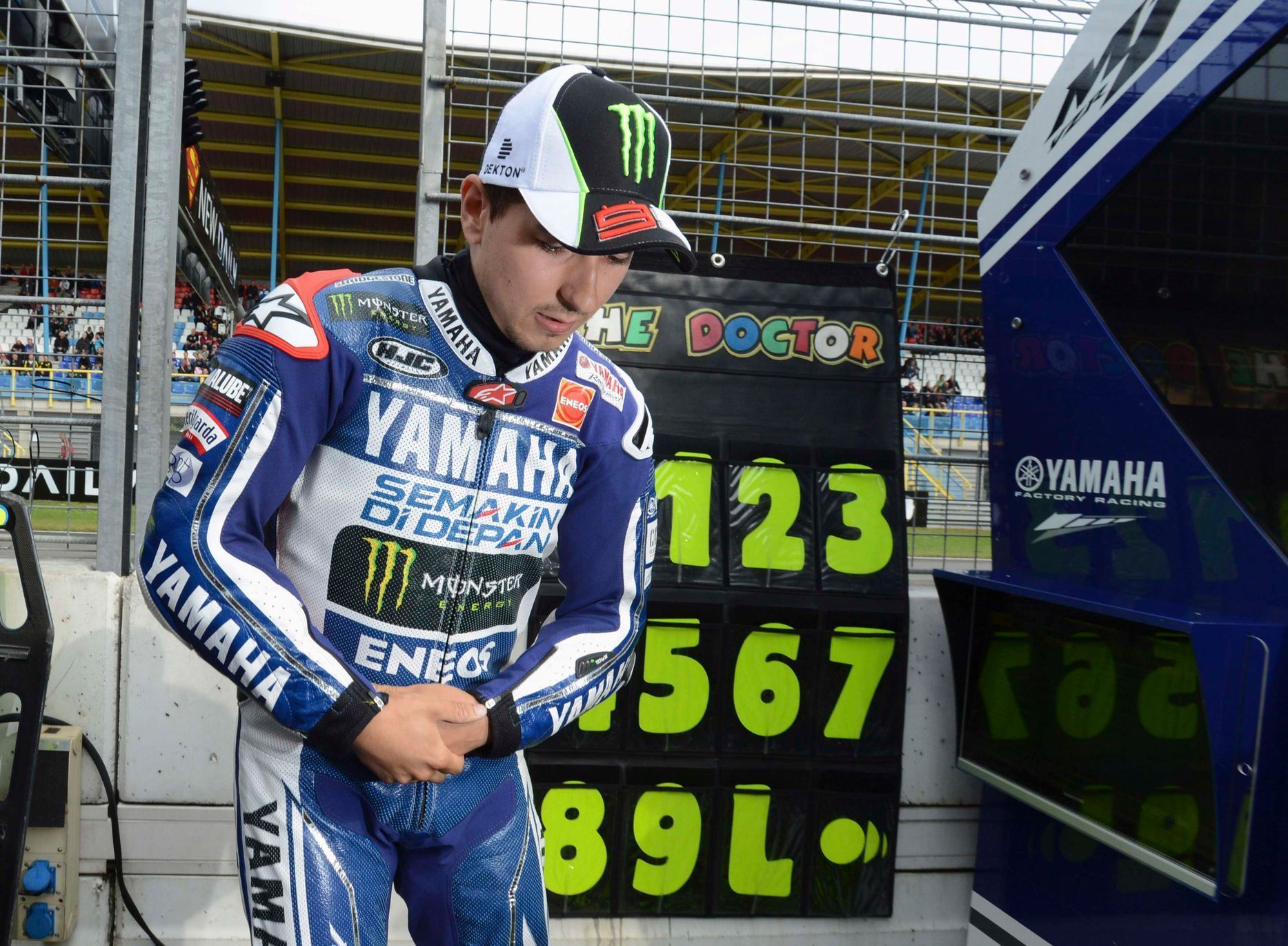 Yamaha MotoGP rider Lorenzo arrives at pits for first practi